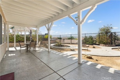 Welcome to this spacious 5-bedroom, 3-bathroom home in the on Menifee Lakes Country Club - Lakes in California - for sale on GolfHomes.com, golf home, golf lot