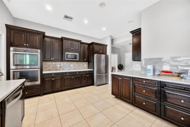 Welcome to this desirable gated community of Bay Hill Village! on Arnold Palmers Bay Hill Club and Lodge  in Florida - for sale on GolfHomes.com, golf home, golf lot