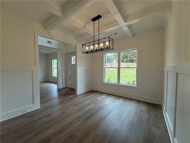 Stunning 2-story home with a 3rd car garage in a coveted on Traditions of Braselton Golf Club in Georgia - for sale on GolfHomes.com, golf home, golf lot