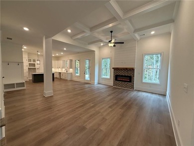 Stunning 2-story home with a 3rd car garage in a coveted on Traditions of Braselton Golf Club in Georgia - for sale on GolfHomes.com, golf home, golf lot