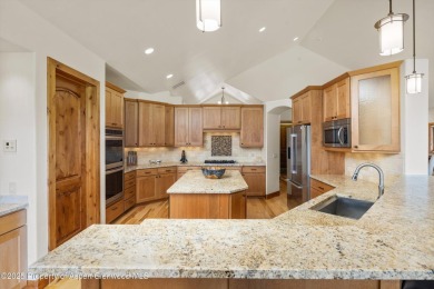 Exquisitely maintained custom home offers enduring finishes from on River Valley Ranch Golf Club in Colorado - for sale on GolfHomes.com, golf home, golf lot
