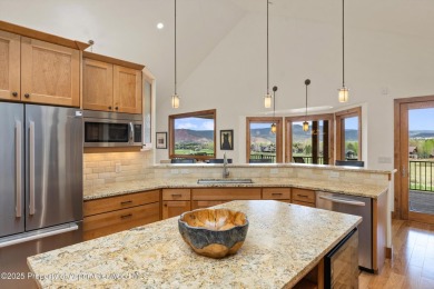 Exquisitely maintained custom home offers enduring finishes from on River Valley Ranch Golf Club in Colorado - for sale on GolfHomes.com, golf home, golf lot