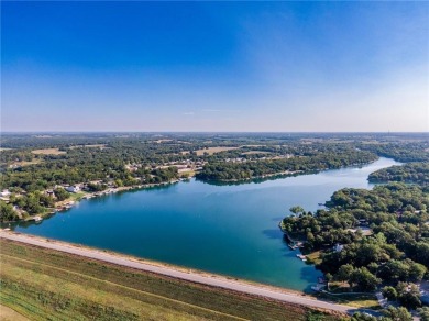 Welcome to lake life living at Linn Valley Lakes. This home is on Linn Valley Lakes - Deer Trace Golf Course in Kansas - for sale on GolfHomes.com, golf home, golf lot