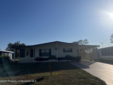 Great curb appeal. This 2 bedroom 2 bath has room to spread out on High Point Golf Club, Inc. in Florida - for sale on GolfHomes.com, golf home, golf lot