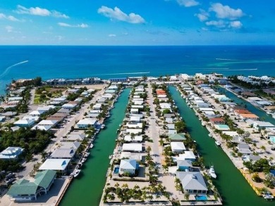 Welcome to your Key Colony Beach Escape, a beautifully on Key Colony Beach Golf Course in Florida - for sale on GolfHomes.com, golf home, golf lot