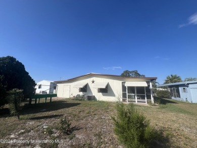 Great curb appeal. This 2 bedroom 2 bath has room to spread out on High Point Golf Club, Inc. in Florida - for sale on GolfHomes.com, golf home, golf lot