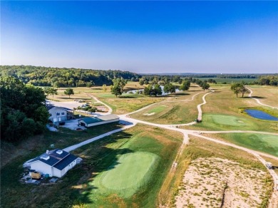 Welcome to lake life living at Linn Valley Lakes. This home is on Linn Valley Lakes - Deer Trace Golf Course in Kansas - for sale on GolfHomes.com, golf home, golf lot