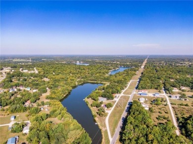 Welcome to lake life living at Linn Valley Lakes. This home is on Linn Valley Lakes - Deer Trace Golf Course in Kansas - for sale on GolfHomes.com, golf home, golf lot