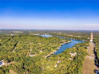 Welcome to lake life living at Linn Valley Lakes. This home is on Linn Valley Lakes - Deer Trace Golf Course in Kansas - for sale on GolfHomes.com, golf home, golf lot