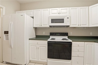 This beautifully updated first-floor, end-unit condominium on The King and Prince Golf Course, Home of the Hampton Club in Georgia - for sale on GolfHomes.com, golf home, golf lot