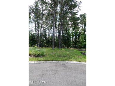 Must see!  Large cul-de-sac lot on a pond in Winding River on Carolina National Golf Club in North Carolina - for sale on GolfHomes.com, golf home, golf lot