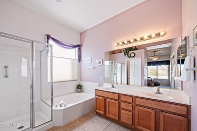 This beautifully maintained residence, located in a desirable on Trilogy Golf Club At Power Ranch in Arizona - for sale on GolfHomes.com, golf home, golf lot