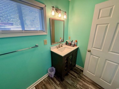 JUST LISTED! WELL CONSTRUCTED STICKBUILT BEACH HOUSE CENTRALLY on Prestwick Country Club in South Carolina - for sale on GolfHomes.com, golf home, golf lot