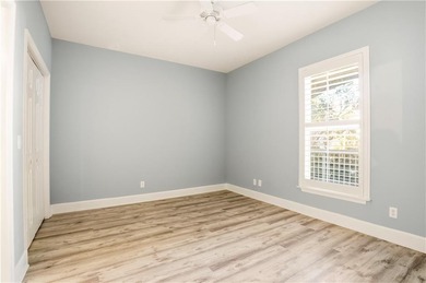 This beautifully updated first-floor, end-unit condominium on The King and Prince Golf Course, Home of the Hampton Club in Georgia - for sale on GolfHomes.com, golf home, golf lot