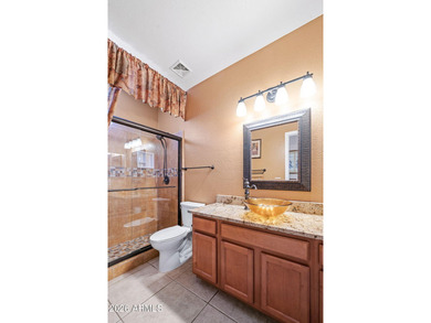 This beautifully maintained residence, located in a desirable on Trilogy Golf Club At Power Ranch in Arizona - for sale on GolfHomes.com, golf home, golf lot