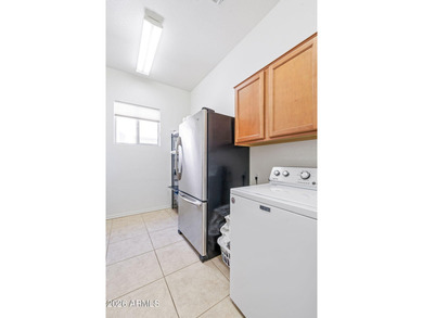 This beautifully maintained residence, located in a desirable on Trilogy Golf Club At Power Ranch in Arizona - for sale on GolfHomes.com, golf home, golf lot