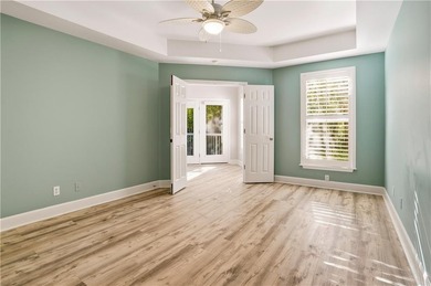 This beautifully updated first-floor, end-unit condominium on The King and Prince Golf Course, Home of the Hampton Club in Georgia - for sale on GolfHomes.com, golf home, golf lot