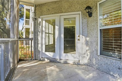 This beautifully updated first-floor, end-unit condominium on The King and Prince Golf Course, Home of the Hampton Club in Georgia - for sale on GolfHomes.com, golf home, golf lot