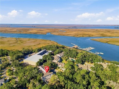 This beautifully updated first-floor, end-unit condominium on The King and Prince Golf Course, Home of the Hampton Club in Georgia - for sale on GolfHomes.com, golf home, golf lot
