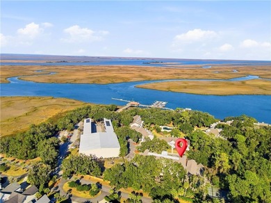 This beautifully updated first-floor, end-unit condominium on The King and Prince Golf Course, Home of the Hampton Club in Georgia - for sale on GolfHomes.com, golf home, golf lot