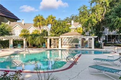 This beautifully updated first-floor, end-unit condominium on The King and Prince Golf Course, Home of the Hampton Club in Georgia - for sale on GolfHomes.com, golf home, golf lot