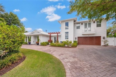 Gorgeous completely renovated home with sweeping golf course on Country Club of Naples in Florida - for sale on GolfHomes.com, golf home, golf lot