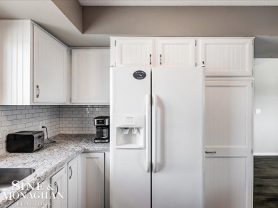 Welcome to this bright and spacious corner unit in condo in on St Clair River Country Club in Michigan - for sale on GolfHomes.com, golf home, golf lot