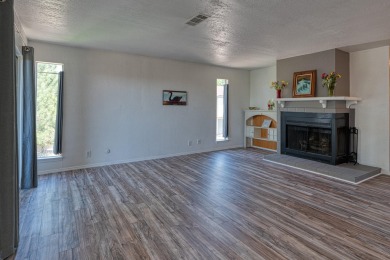 Complete with a Stair Lift to the main living space. Open floor on Arroyo Del Oso Golf Course in New Mexico - for sale on GolfHomes.com, golf home, golf lot