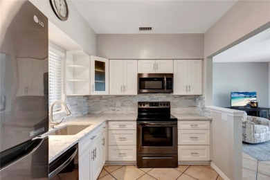 Welcome to 5020 Harmony Circle #303, where luxury living meets on Oak Harbor Country Club in Florida - for sale on GolfHomes.com, golf home, golf lot
