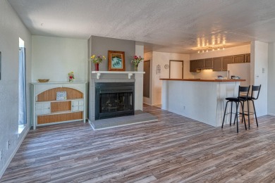 Complete with a Stair Lift to the main living space. Open floor on Arroyo Del Oso Golf Course in New Mexico - for sale on GolfHomes.com, golf home, golf lot