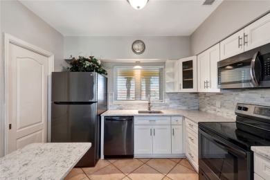 Welcome to 5020 Harmony Circle #303, where luxury living meets on Oak Harbor Country Club in Florida - for sale on GolfHomes.com, golf home, golf lot