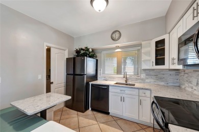 Welcome to 5020 Harmony Circle #303, where luxury living meets on Oak Harbor Country Club in Florida - for sale on GolfHomes.com, golf home, golf lot