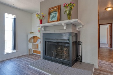 Complete with a Stair Lift to the main living space. Open floor on Arroyo Del Oso Golf Course in New Mexico - for sale on GolfHomes.com, golf home, golf lot