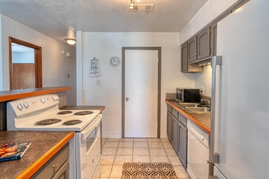 Complete with a Stair Lift to the main living space. Open floor on Arroyo Del Oso Golf Course in New Mexico - for sale on GolfHomes.com, golf home, golf lot