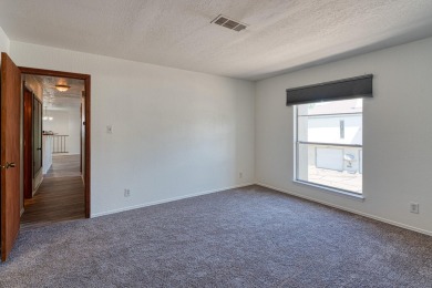 Complete with a Stair Lift to the main living space. Open floor on Arroyo Del Oso Golf Course in New Mexico - for sale on GolfHomes.com, golf home, golf lot