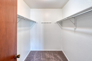 Complete with a Stair Lift to the main living space. Open floor on Arroyo Del Oso Golf Course in New Mexico - for sale on GolfHomes.com, golf home, golf lot