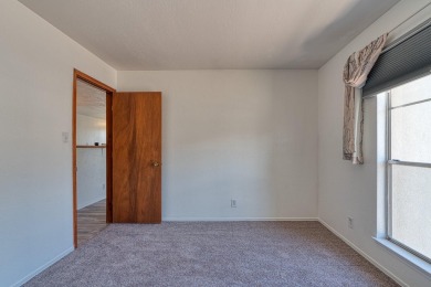Complete with a Stair Lift to the main living space. Open floor on Arroyo Del Oso Golf Course in New Mexico - for sale on GolfHomes.com, golf home, golf lot