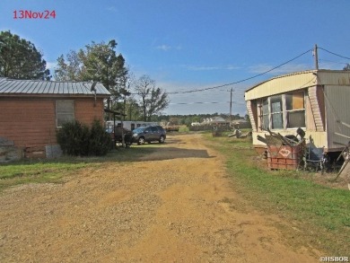 INVESTORS DO NOT MISS THIS ONE!!! 1200 sf main house has been on Nashville Country Club in Arkansas - for sale on GolfHomes.com, golf home, golf lot