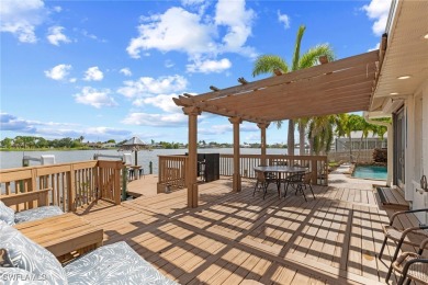 ***Rare Find! Stunning Lakefront Pool Home in SE Cape Coral - A on El Rio Golf Course and Club in Florida - for sale on GolfHomes.com, golf home, golf lot