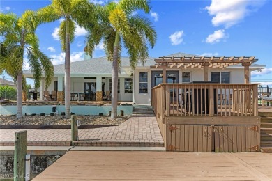 ***Rare Find! Stunning Lakefront Pool Home in SE Cape Coral - A on El Rio Golf Course and Club in Florida - for sale on GolfHomes.com, golf home, golf lot