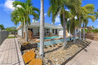 ***Rare Find! Stunning Lakefront Pool Home in SE Cape Coral - A on El Rio Golf Course and Club in Florida - for sale on GolfHomes.com, golf home, golf lot