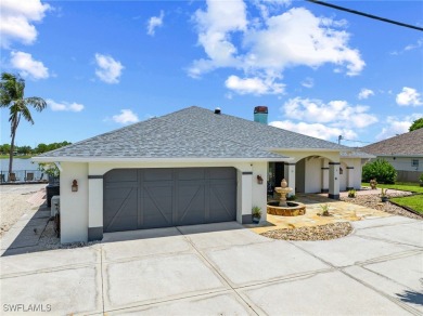 ***Rare Find! Stunning Lakefront Pool Home in SE Cape Coral - A on El Rio Golf Course and Club in Florida - for sale on GolfHomes.com, golf home, golf lot
