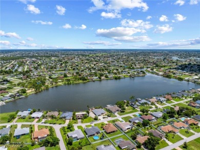 ***Rare Find! Stunning Lakefront Pool Home in SE Cape Coral - A on El Rio Golf Course and Club in Florida - for sale on GolfHomes.com, golf home, golf lot