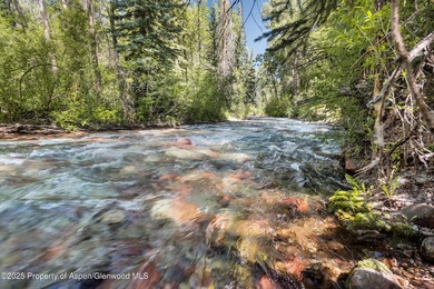 Riverfront single-family homes in Aspen are as rare as powder on Aspen Golf Club in Colorado - for sale on GolfHomes.com, golf home, golf lot