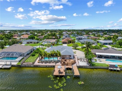 ***Rare Find! Stunning Lakefront Pool Home in SE Cape Coral - A on El Rio Golf Course and Club in Florida - for sale on GolfHomes.com, golf home, golf lot