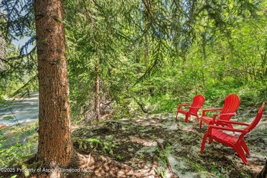 Riverfront single-family homes in Aspen are as rare as powder on Aspen Golf Club in Colorado - for sale on GolfHomes.com, golf home, golf lot