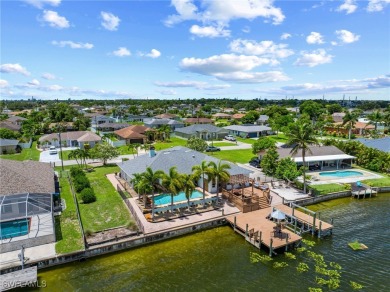 ***Rare Find! Stunning Lakefront Pool Home in SE Cape Coral - A on El Rio Golf Course and Club in Florida - for sale on GolfHomes.com, golf home, golf lot
