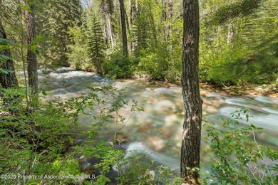 Riverfront single-family homes in Aspen are as rare as powder on Aspen Golf Club in Colorado - for sale on GolfHomes.com, golf home, golf lot