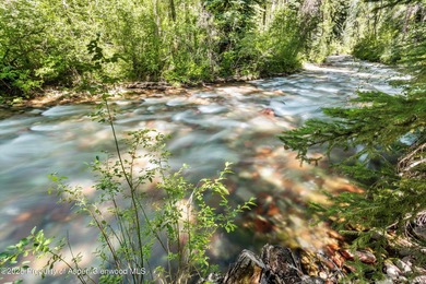 Riverfront single-family homes in Aspen are as rare as powder on Aspen Golf Club in Colorado - for sale on GolfHomes.com, golf home, golf lot