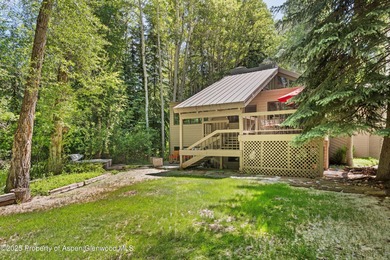 Riverfront single-family homes in Aspen are as rare as powder on Aspen Golf Club in Colorado - for sale on GolfHomes.com, golf home, golf lot